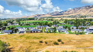 Drone / aerial view featuring a residential view and a mountain view