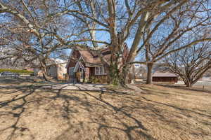 View of front of house featuring a front lawn