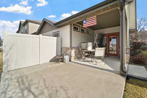 View of patio with fence