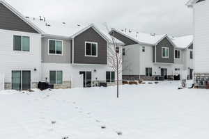 Exterior photo of back of home featuring patio