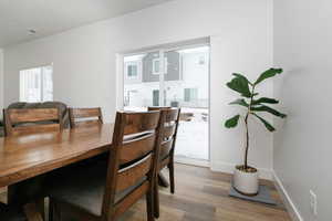 Dining space featuring hardwood / wood-style flooring