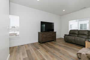 Living room featuring  hardwood / wood-style floors