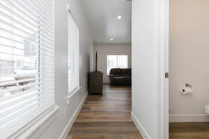 Hallway featuring hardwood / wood-style floors