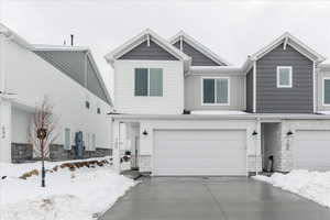 View of front of home featuring a garage