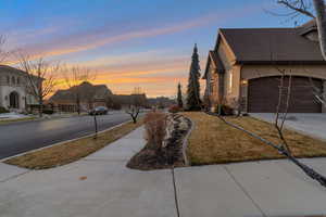 Exterior space featuring curbs, sidewalks, and a residential view