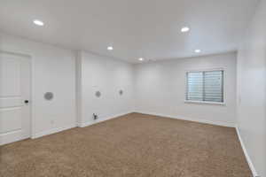 Bedroom 4 with carpet floors, baseboards, and recessed lighting