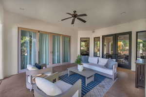 View of patio / terrace with french doors, outdoor lounge area, and ceiling fan