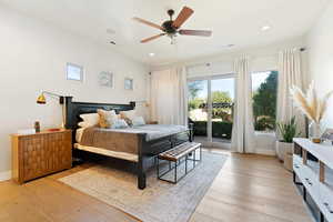 Bedroom featuring light wood-type flooring, access to exterior, visible vents, and recessed lighting