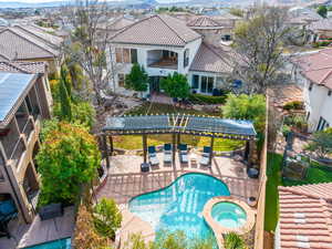 Birds eye view of property with a residential view