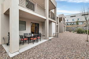 View of patio with fence