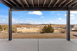 View of patio / terrace with a mountain view