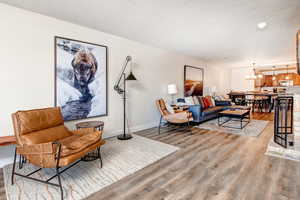 Living area featuring a modern furniture, and light wood finished floors