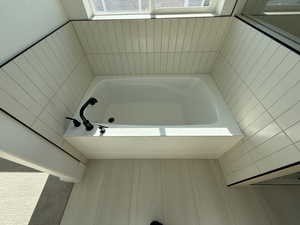 Bathroom featuring a garden tub