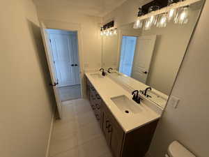 Bathroom with a sink and double vanity