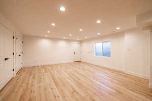 Spare room featuring recessed lighting and light wood-style floors