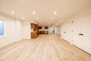 Unfurnished living room with recessed lighting and light wood-style floors
