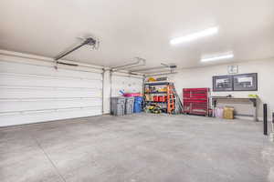 Garage featuring a garage door opener