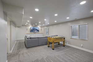 Game room with recessed lighting, visible vents, baseboards, and light colored carpet