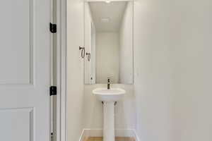 Bathroom featuring baseboards