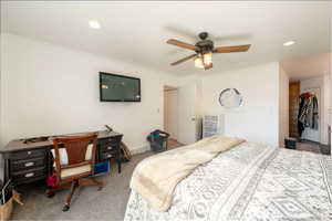 Bedroom featuring recessed lighting, carpet floors, a ceiling fan, ornamental molding, and a closet