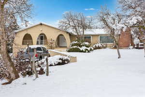 View of front facade with stucco siding