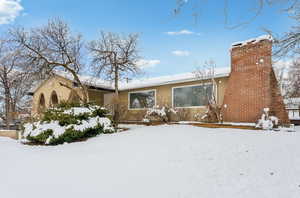 View of front of house with stucco siding