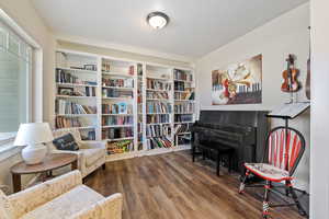 Sitting room featuring wood finished floors