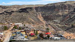 Drone / aerial view featuring a residential view and a mountain view