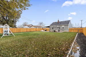 View of yard featuring a fenced backyard, a patio, and a gazebo