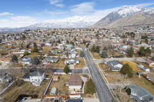 Drone / aerial view with a residential view and a mountain view