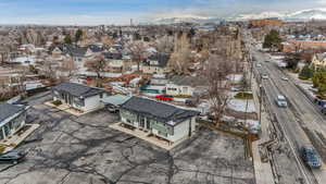 Drone / aerial view featuring a residential view and a mountain view