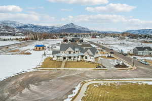 Snowy aerial view with a mountain view