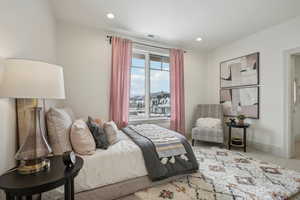 Carpeted bedroom featuring baseboards, visible vents, and recessed lighting