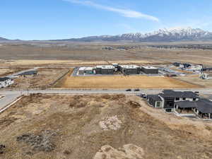 Birds eye view of property with a mountain view and a rural view