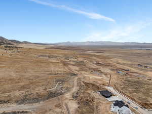 Drone / aerial view featuring a mountain view and a rural view