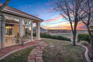 View of yard at dusk