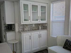 Interior space featuring decorative backsplash