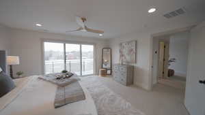 Bedroom featuring access to outside, visible vents, light carpet, and recessed lighting