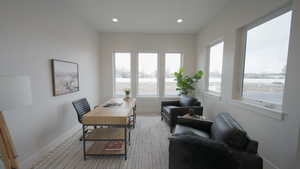 Office space featuring recessed lighting and baseboards