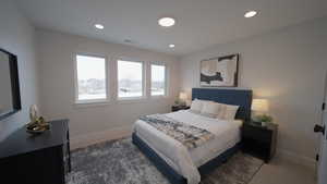 Bedroom featuring baseboards, visible vents, and recessed lighting