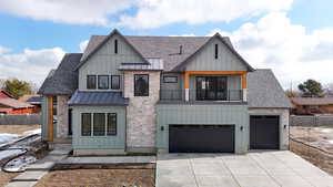 Modern farmhouse featuring a balcony, a standing seam roof, a shingled roof, and board and batten siding