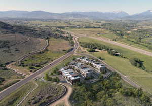 Birds eye view of property featuring a mountain view