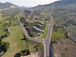 Birds eye view of property with a mountain view