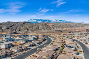 Birds eye view of property with a residential view and a mountain view