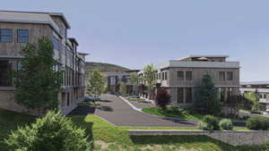 View of community with uncovered parking and a residential view