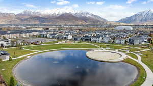 Exterior space featuring a water and mountain view and a residential view