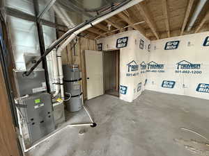 Unfinished basement with electric water heater