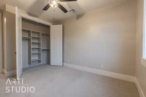 Unfurnished bedroom featuring a closet, visible vents, light carpet, and baseboards