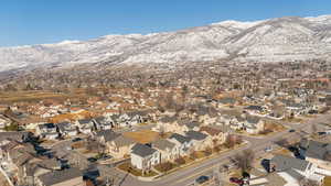 Property view of mountains with a residential view