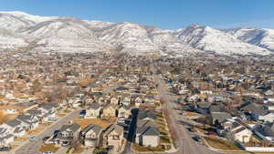 Property view of mountains with a residential view